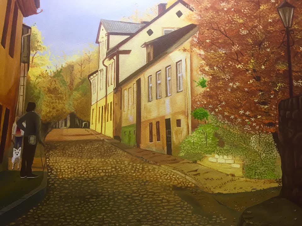 Pintura de una calle empedrada con casas y árboles